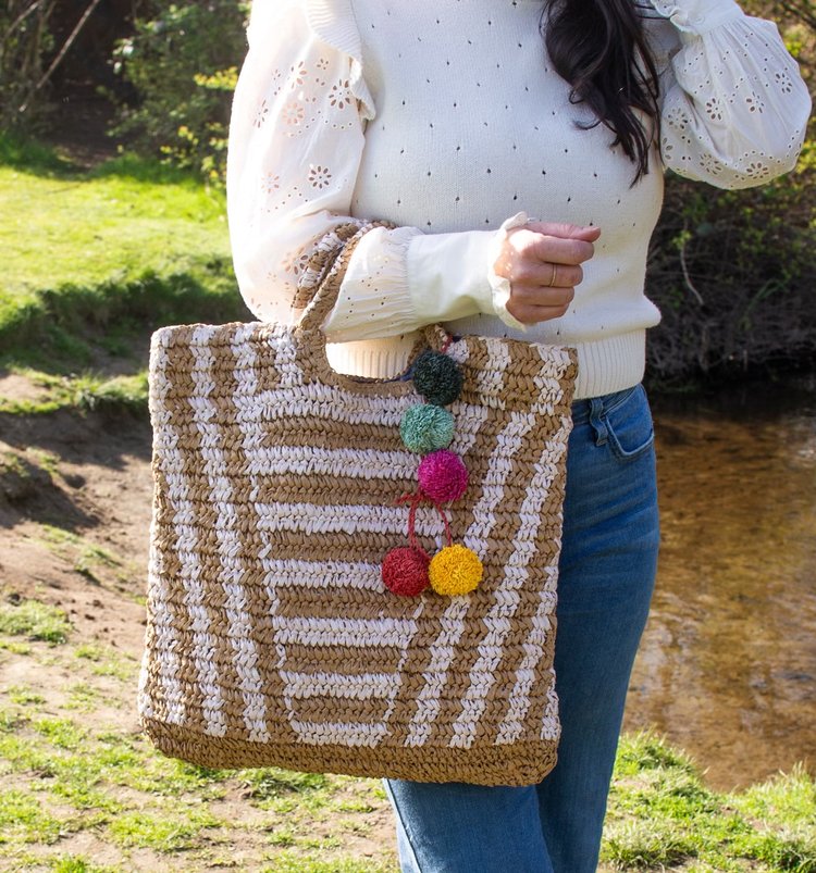 women carrying acapulcotote bag